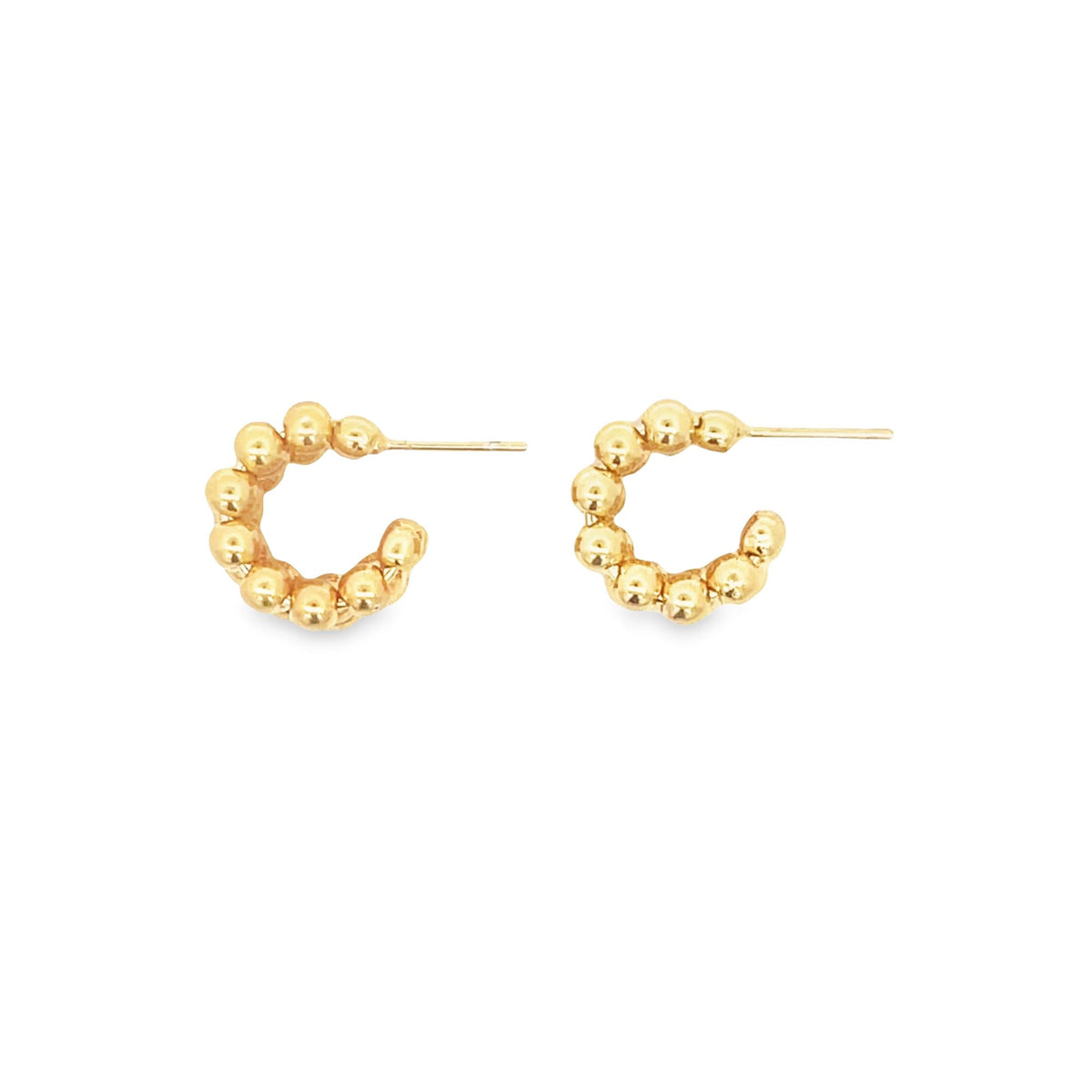 A pair of gold beaded hoop earrings features a textured design with small spherical beads arranged in a semi-circle.