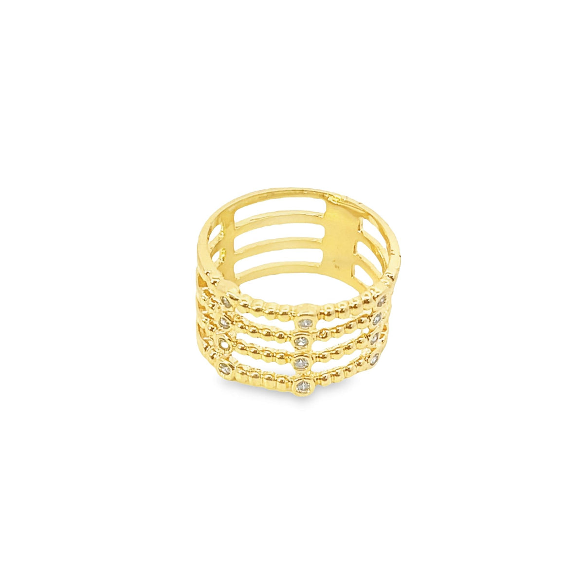 A wide gold multi-band ring features beaded edges and sparkling diamond accents along its four interconnected rows.