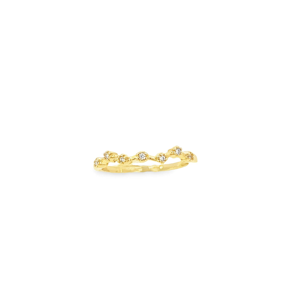 A delicate gold band ring features an organic, wavy design studded with sparkling diamonds.