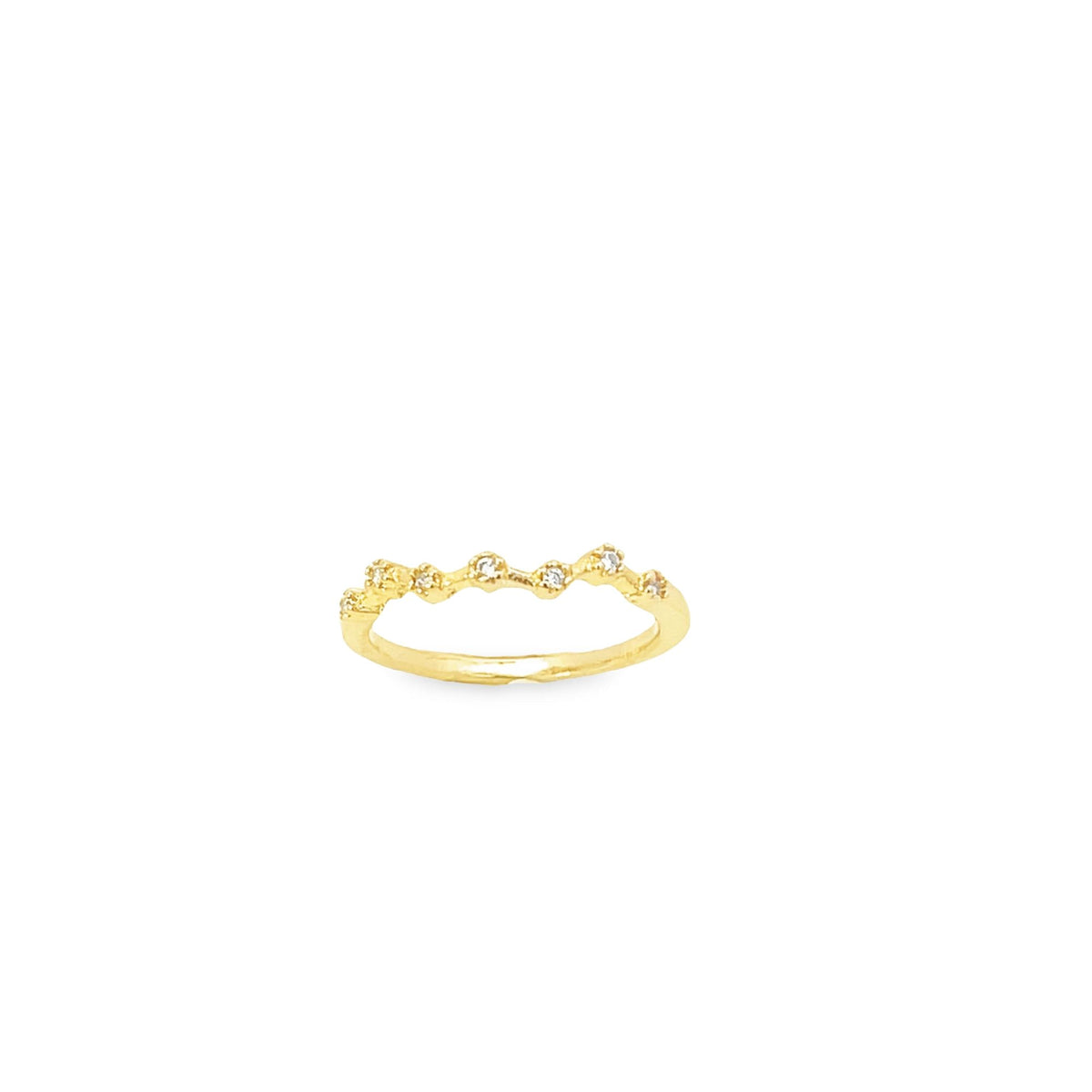 A delicate gold diamond ring features a wavy, organic design set with sparkling stones against a plain white background.