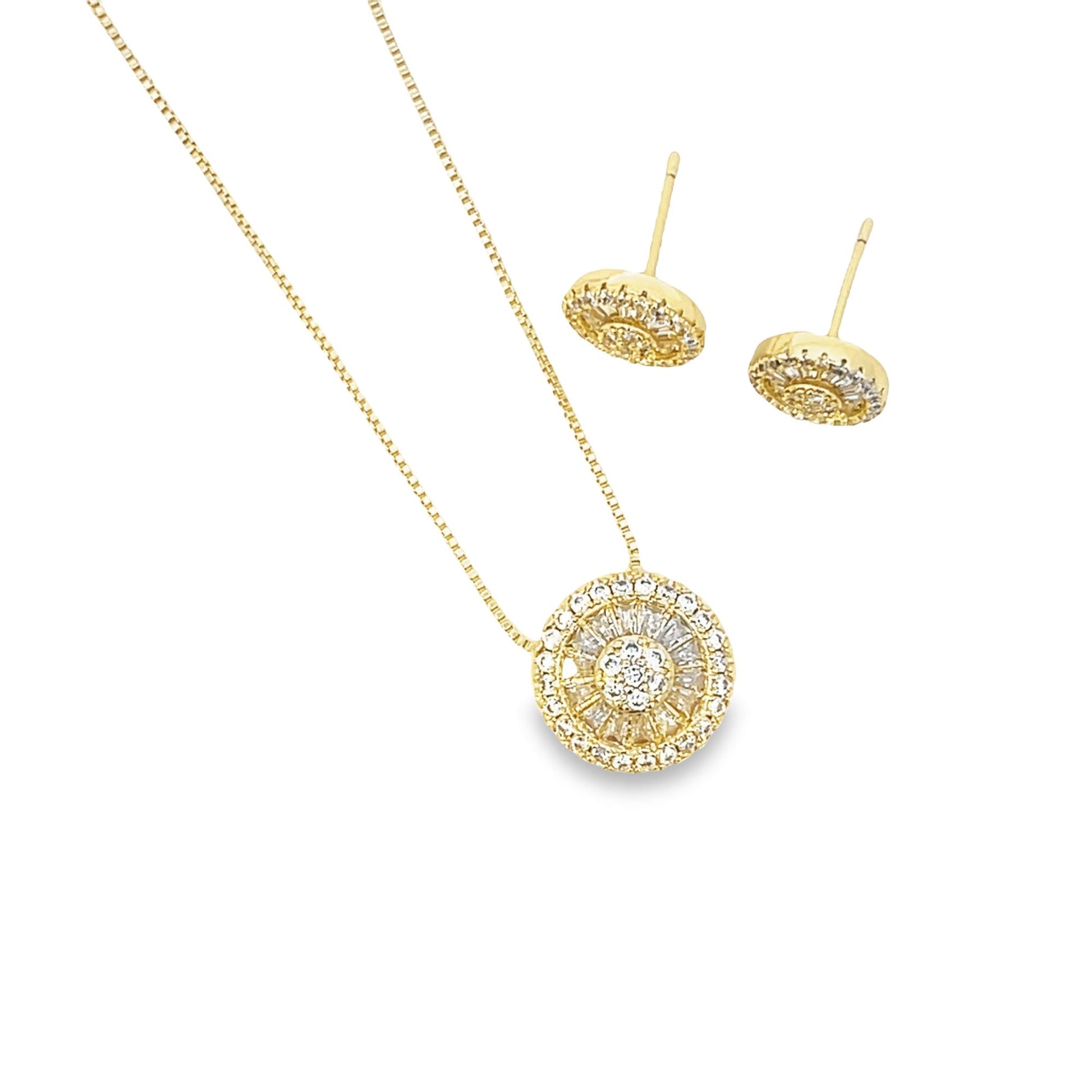 A matching gold jewelry set features a delicate chain necklace and stud earrings, each adorned with a circular cluster of sparkling diamonds.