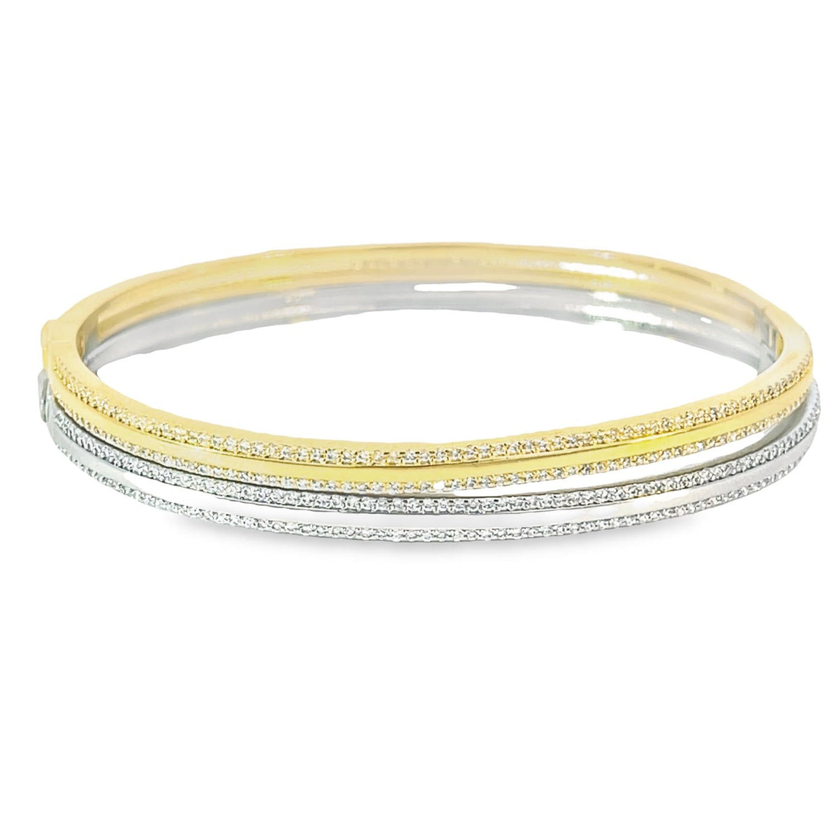A two-tone diamond bangle bracelet features interlocking yellow gold and white gold bands sparkling with pavé-set stones against a clean white background.