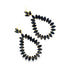 A pair of elegant teardrop-shaped dangle earrings features dark marquise-cut navy blue stones set in gold against a clean white background.