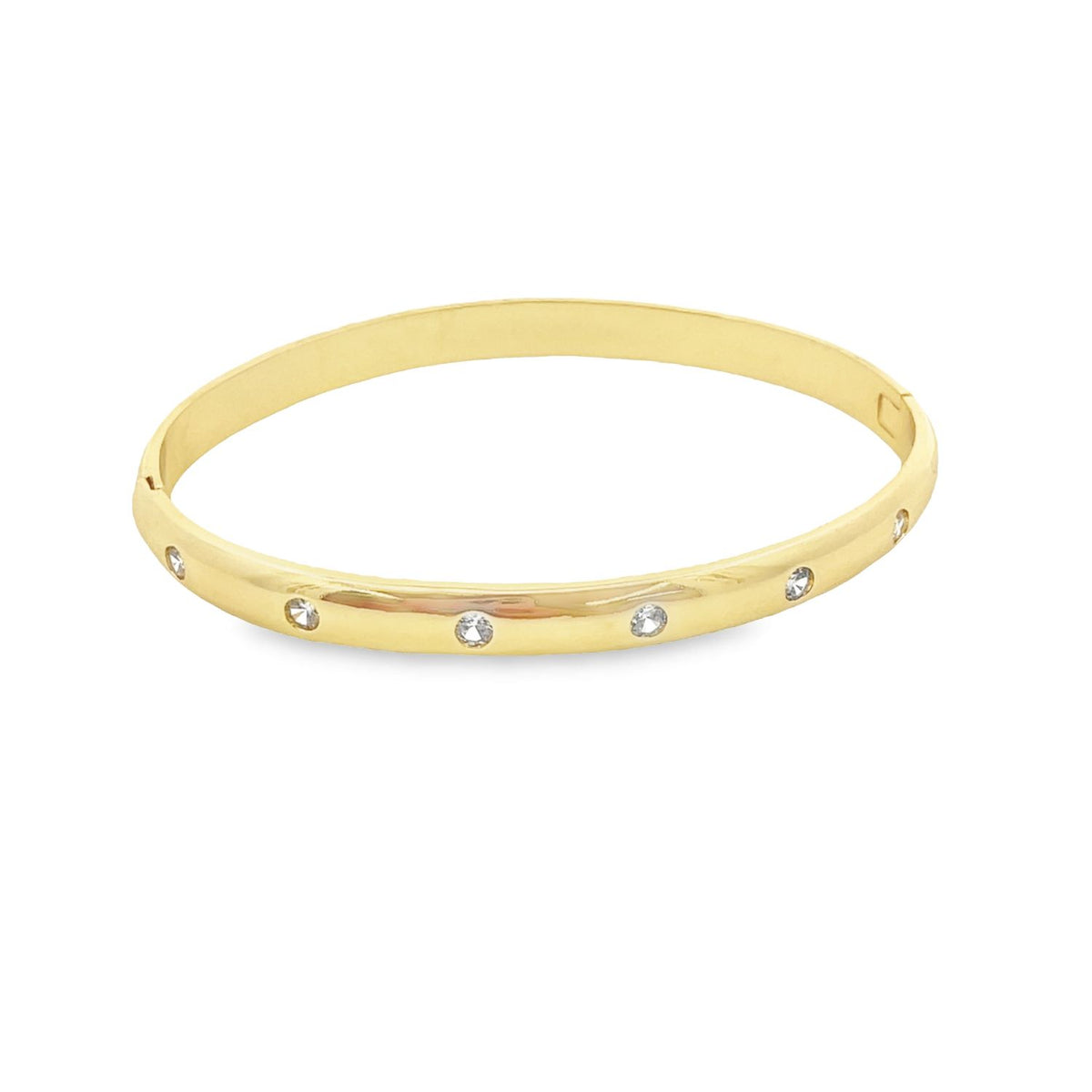 A sleek gold bangle bracelet sparkles with embedded cubic zirconia stones against a white background.