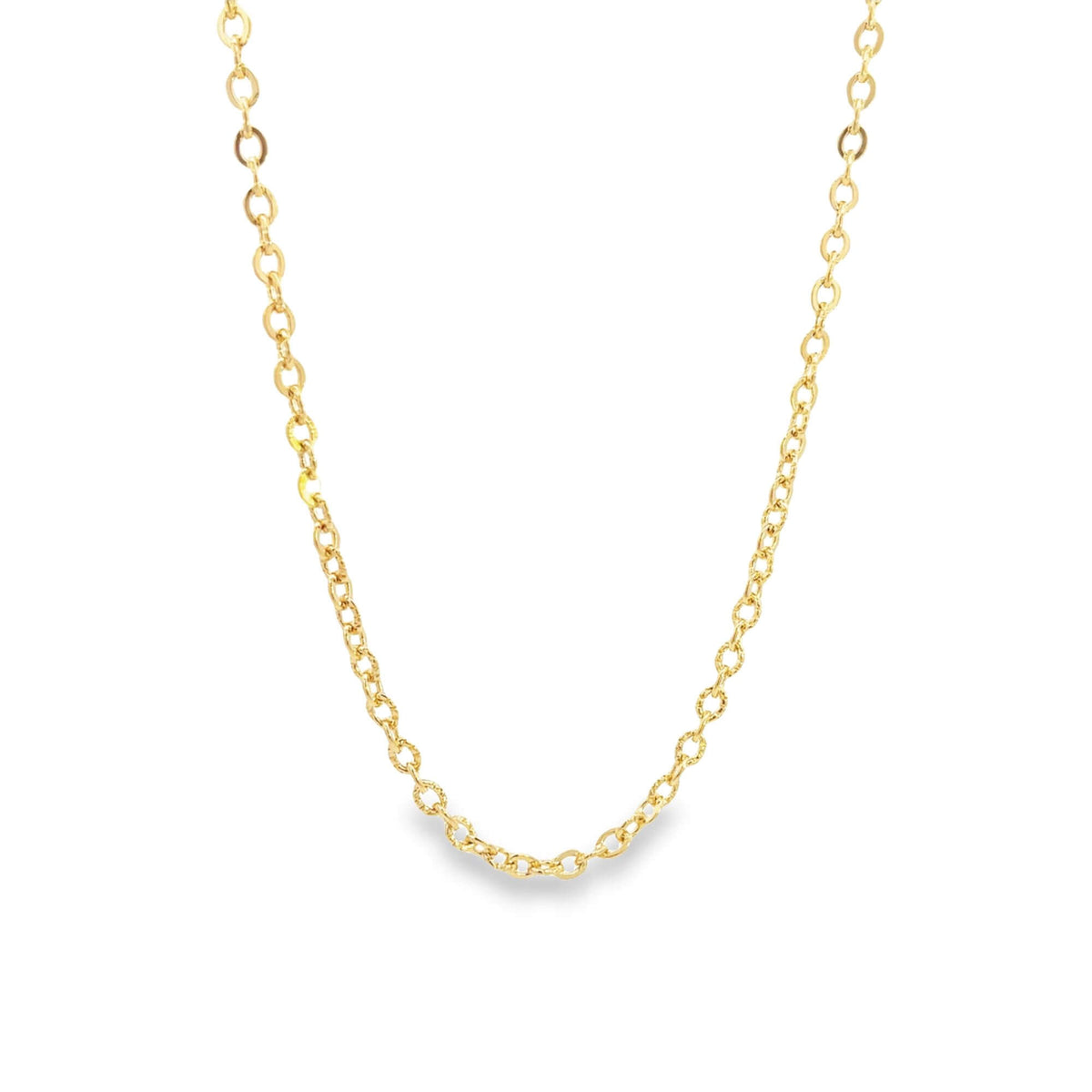 A delicate gold chain necklace drapes in a graceful curve against a clean white background.