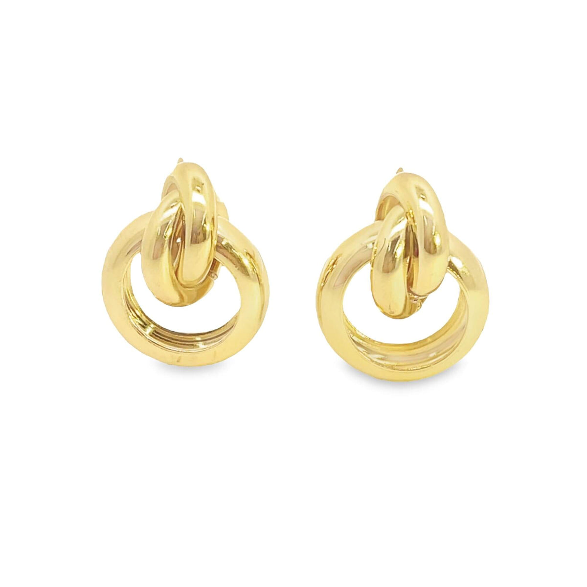 A pair of polished gold interlocking double-hoop earrings displays a modern design against a plain white background.
