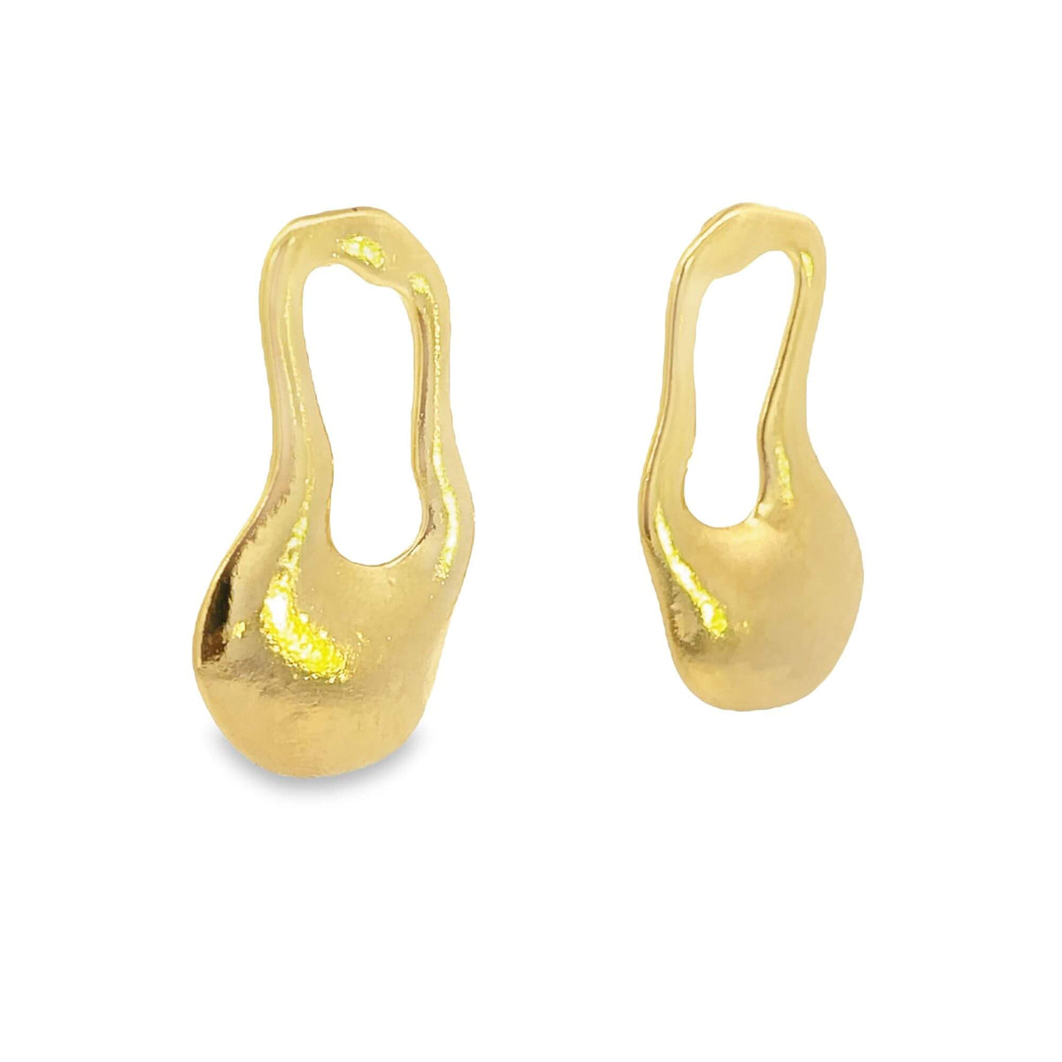 A pair of polished gold earrings with an organic, asymmetric shape resting against a clean white background.