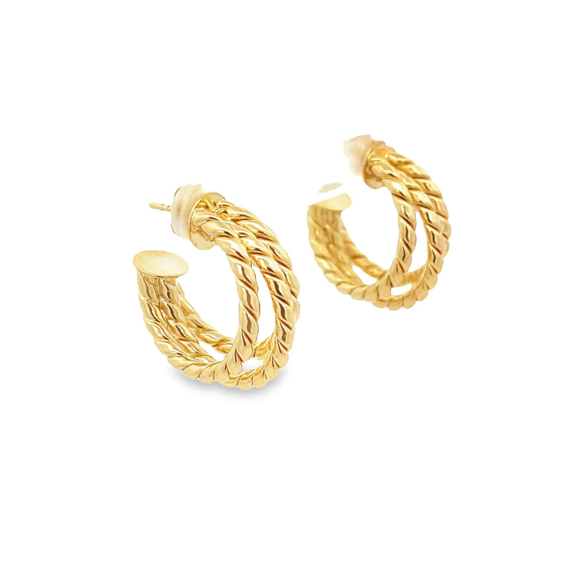 A pair of shiny gold twisted hoop earrings gleams against a plain white background.
