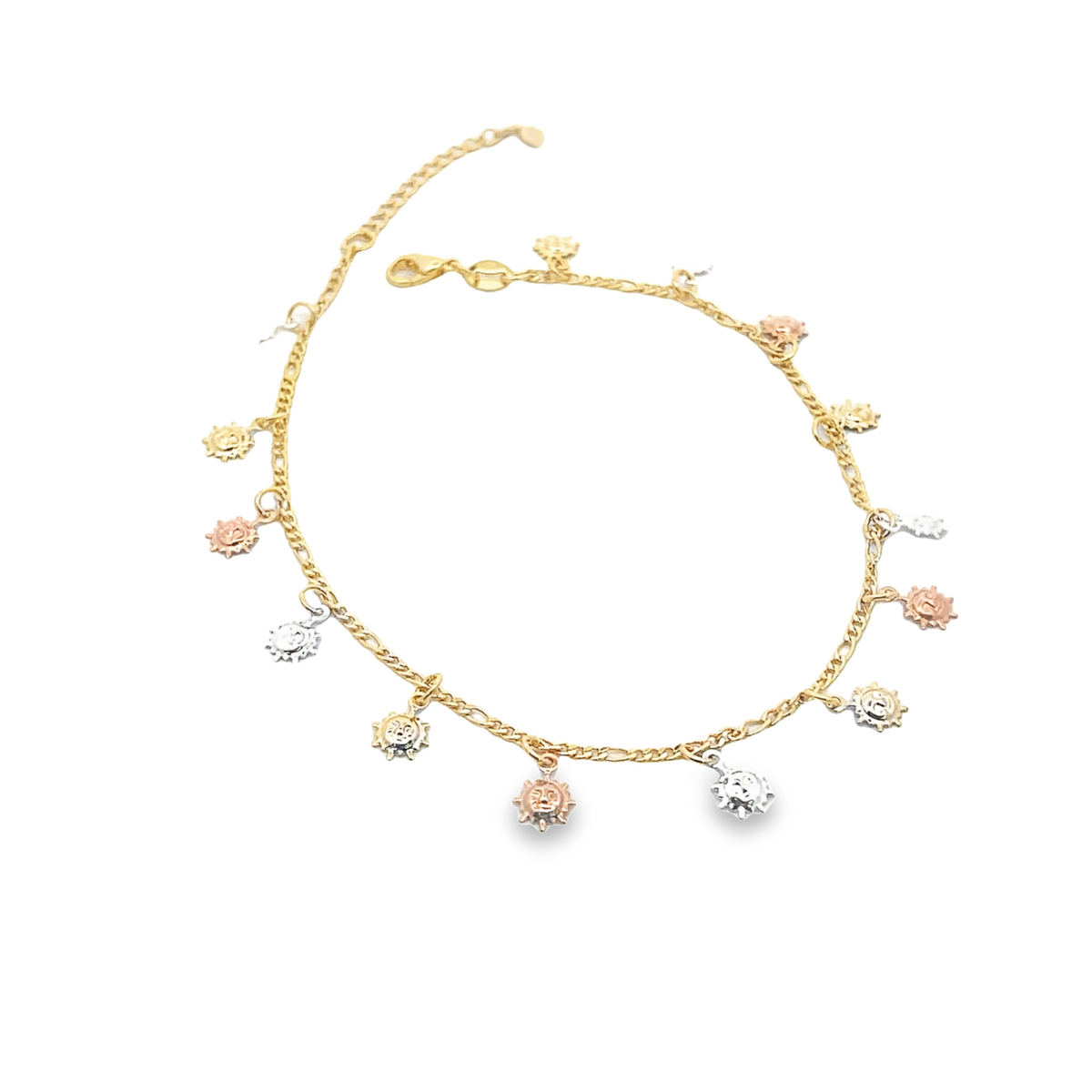 A delicate tricolor gold anklet features dangling sun charms against a plain white background.