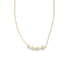 A delicate gold tennis necklace features sparkling diamond accents and spells out the word LOVE in charming pendant letters.