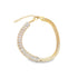 A gold half-chain and half-crystal tennis bracelet showcases a polished herringbone chain connected to a row of sparkling baguette cubic zirconia stones.