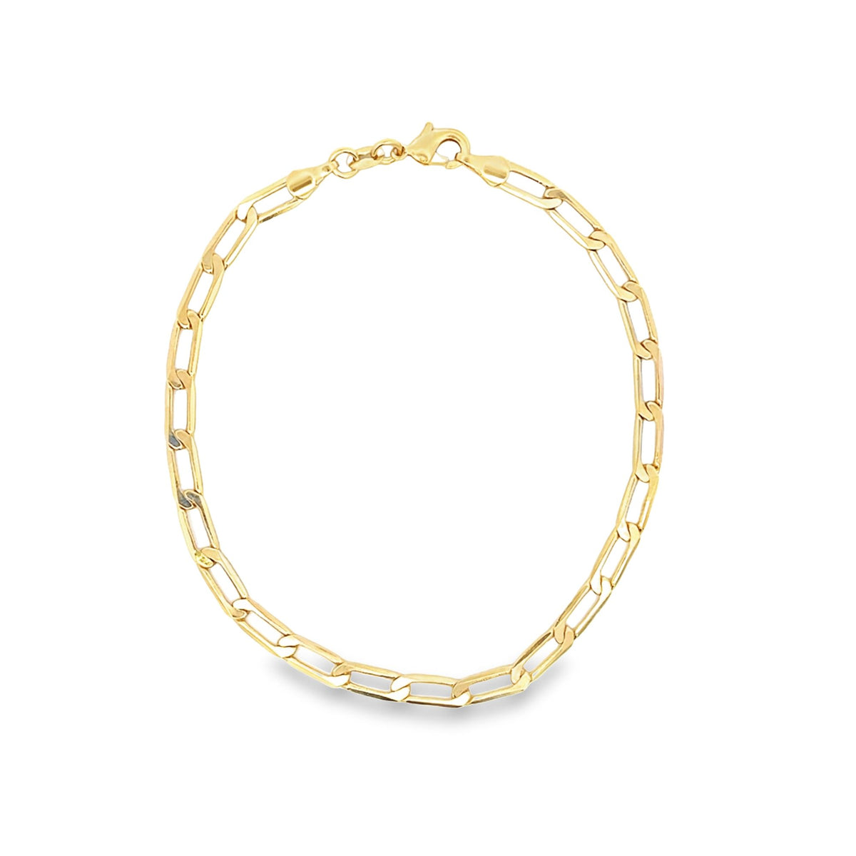 A gleaming gold link chain necklace lies arranged in a circle against a clean white background.