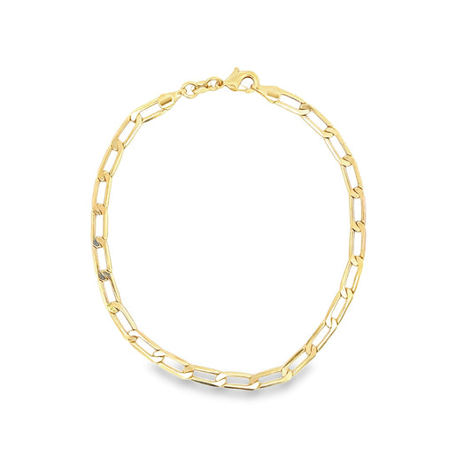 A gleaming gold link chain necklace lies arranged in a circle against a clean white background.