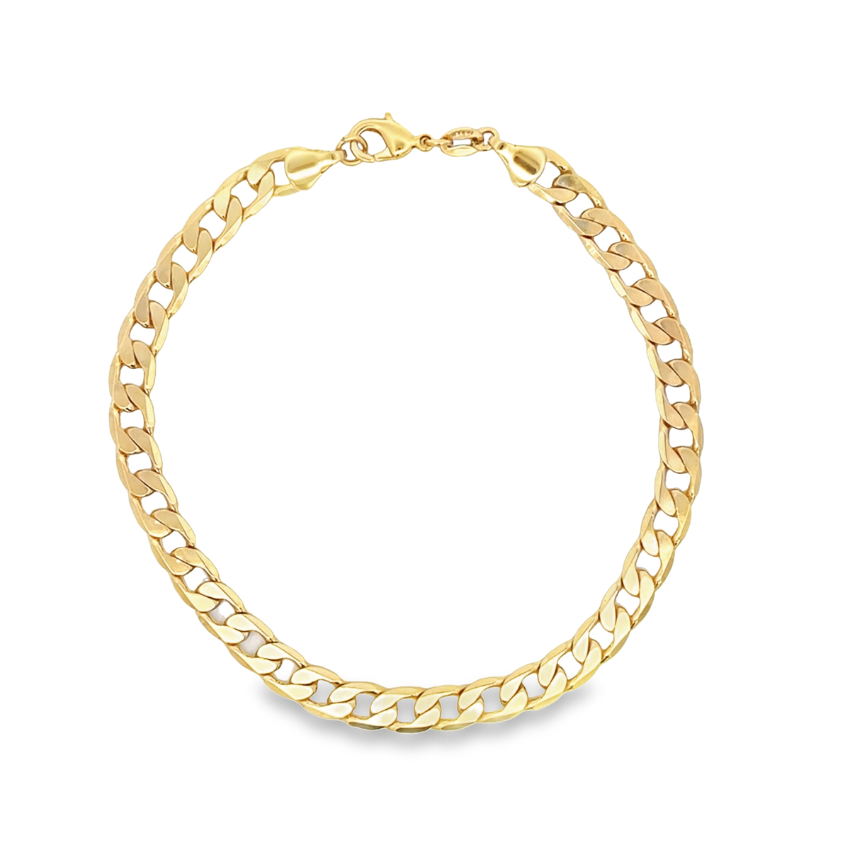 A polished gold curb chain necklace forms a circle against a white background.