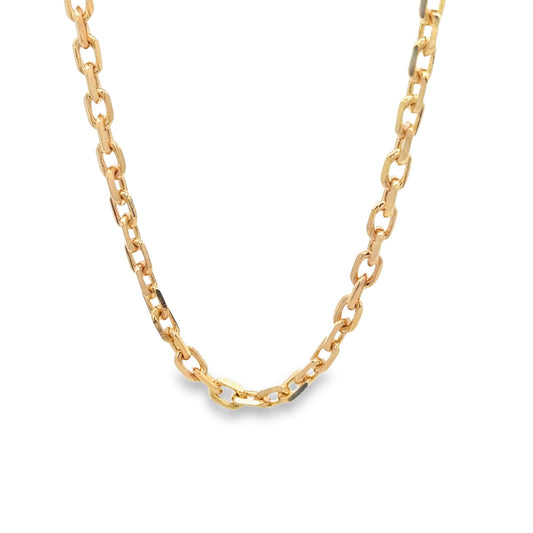 A shiny gold link chain necklace drapes against a clean white background.
