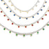 Four cascading rhinestone tennis necklaces display dangling gemstone charms in clear, blue, red, and green against a white background.