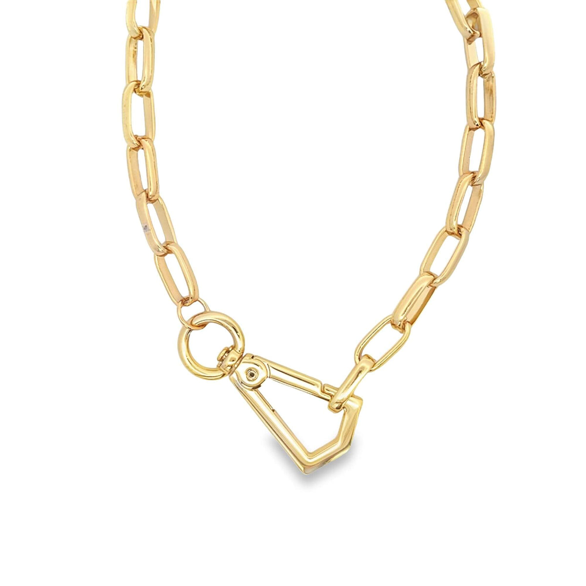 A chunky gold link necklace features a distinctive geometric clasp centered on a white background.
