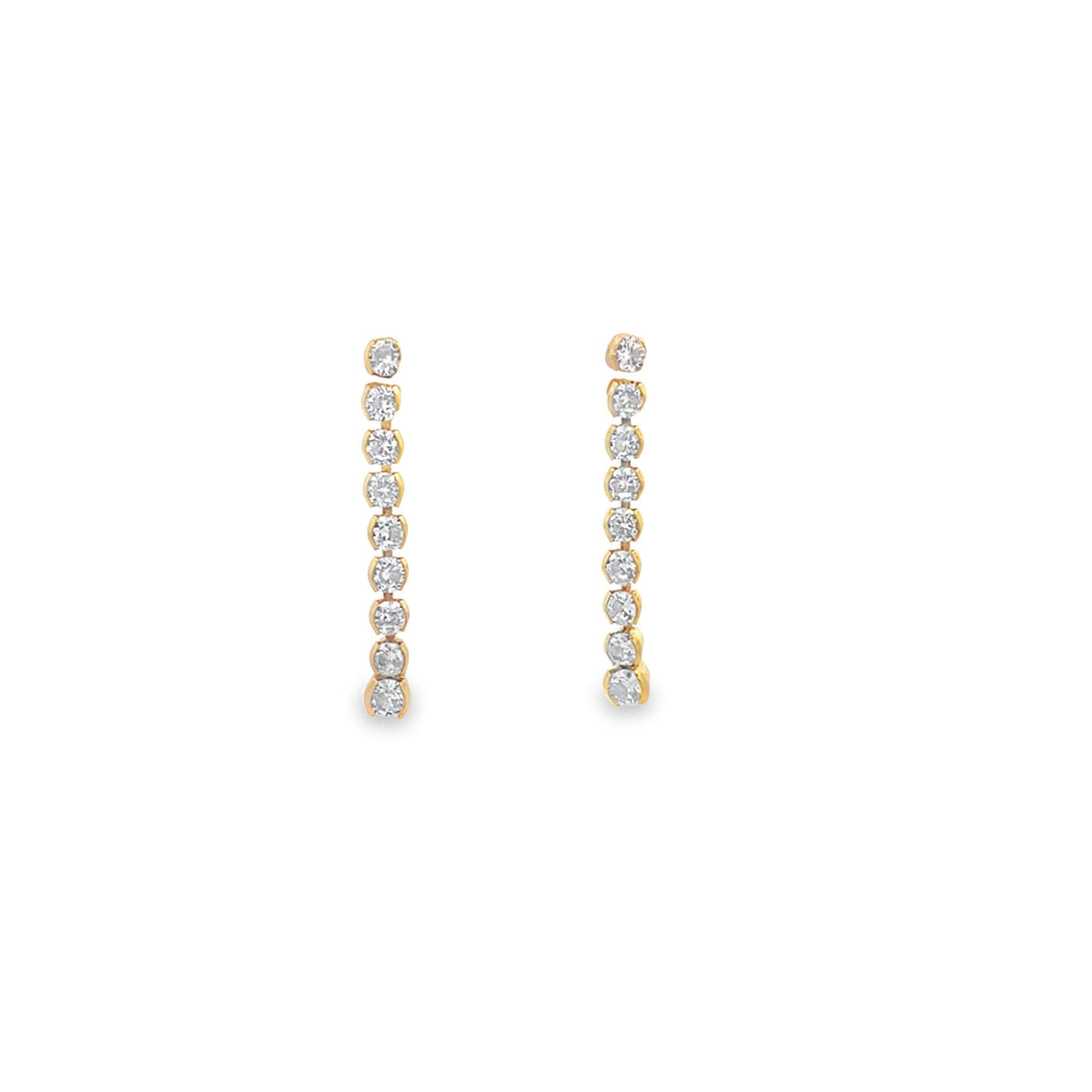 A pair of gold diamond line drop earrings sparkles against a clean white background.