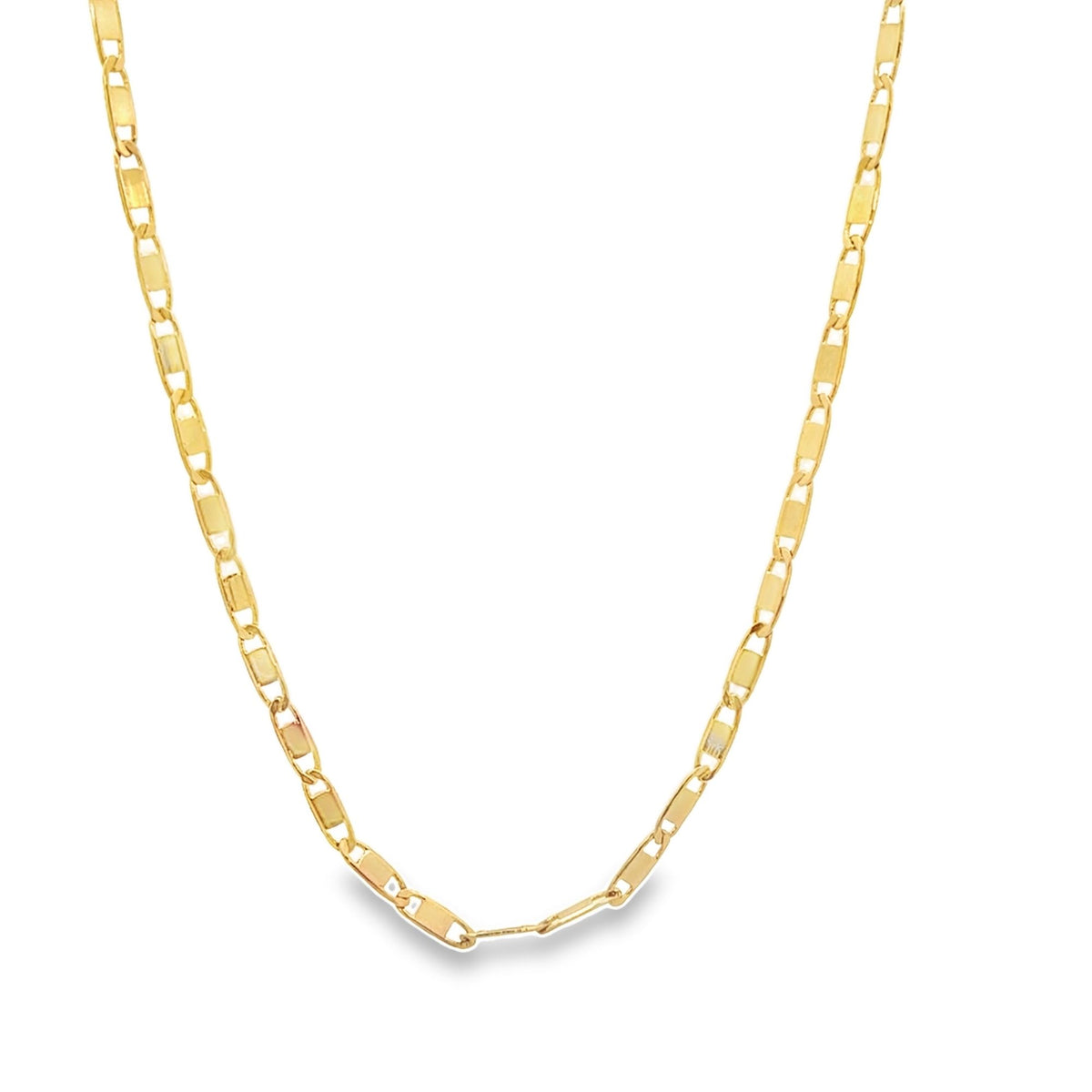 A shiny gold link chain necklace hangs against a white background.