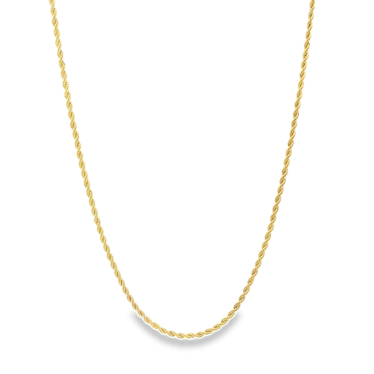 A delicate gold rope chain necklace drapes gracefully against a plain white background.