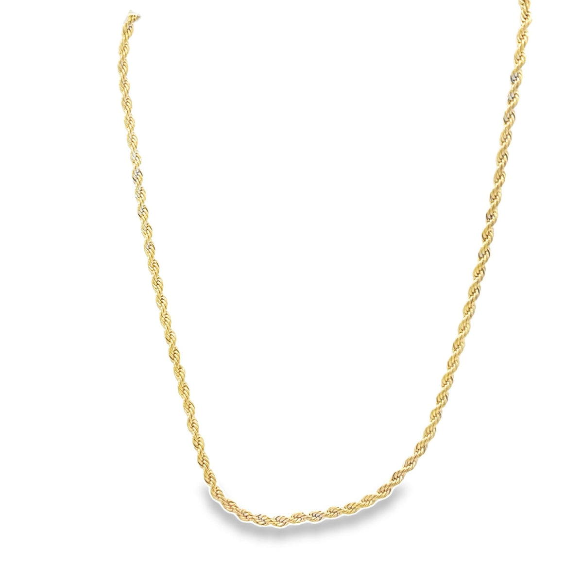 A delicate gold rope chain necklace drapes against a clean white background.