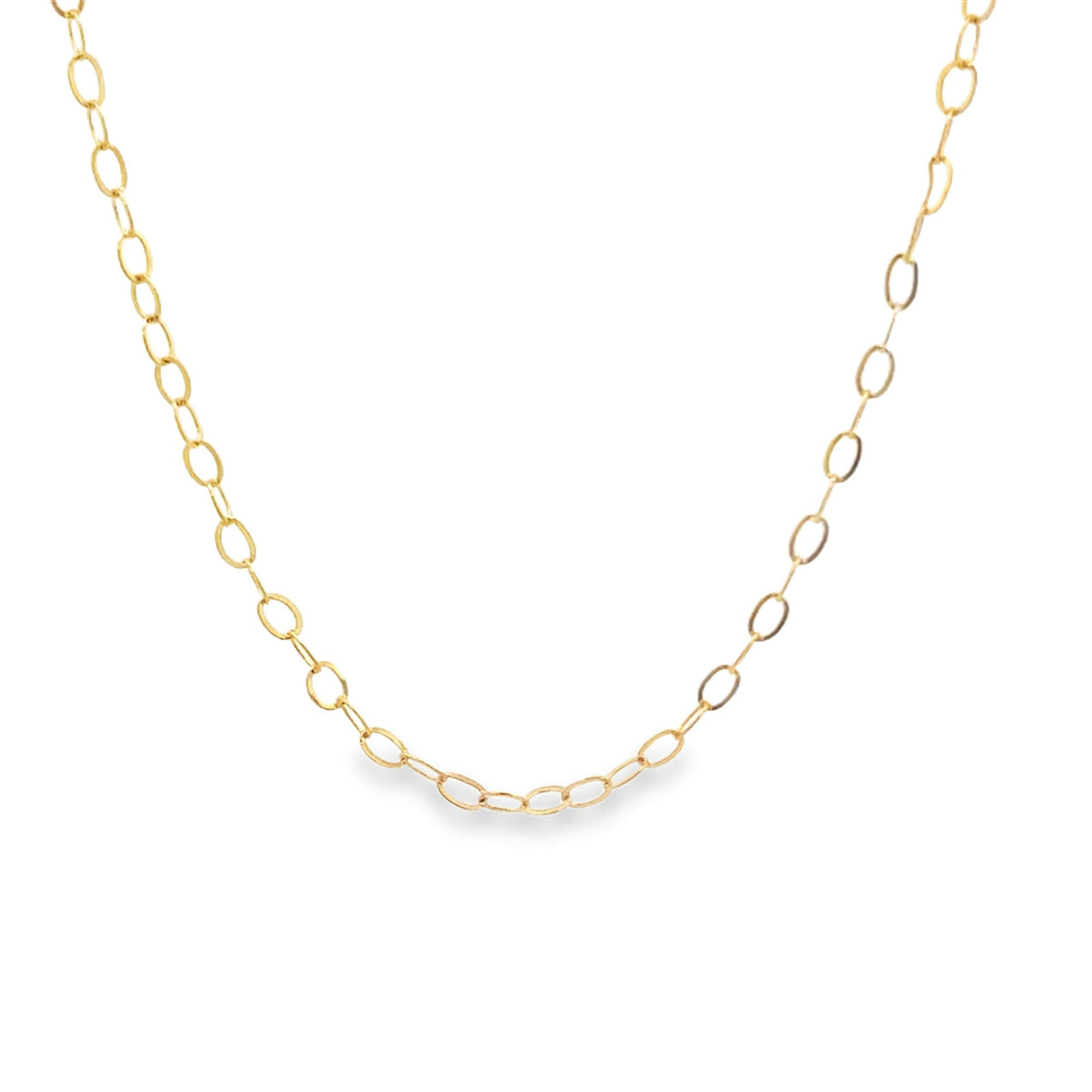 A delicate gold chain necklace drapes in a smooth curve against a clean white background.