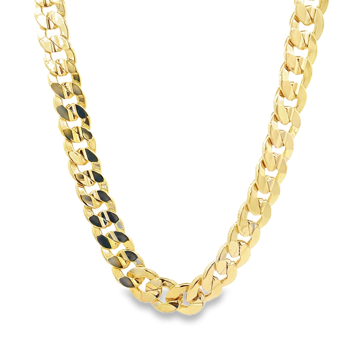 A thick yellow gold Cuban link chain necklace catches the light against a white background.
