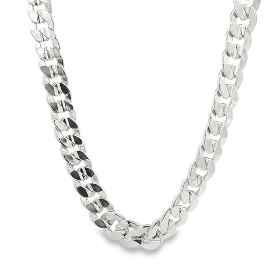 A thick sterling silver cuban link chain necklace drapes against a clean white background.