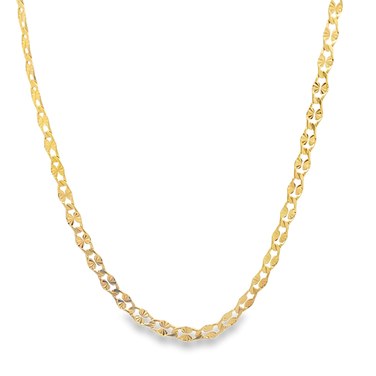 A delicate, shimmering gold chain necklace curves gracefully against a plain white background.