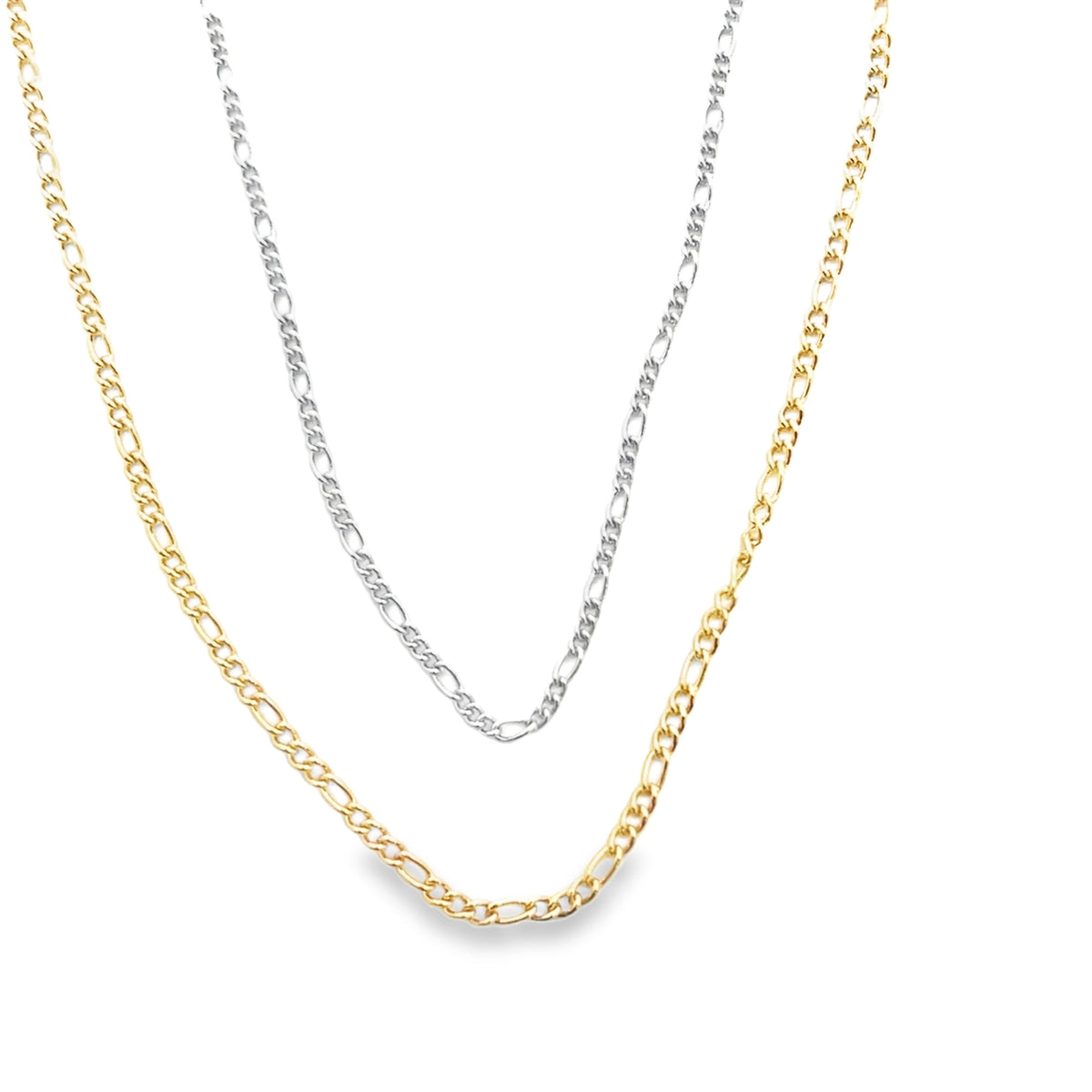 Two layered Figaro chains display a contrasting gold and silver necklace design against a clean white background.