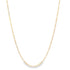 A delicate gold Figaro link chain necklace drapes gracefully against a white background.
