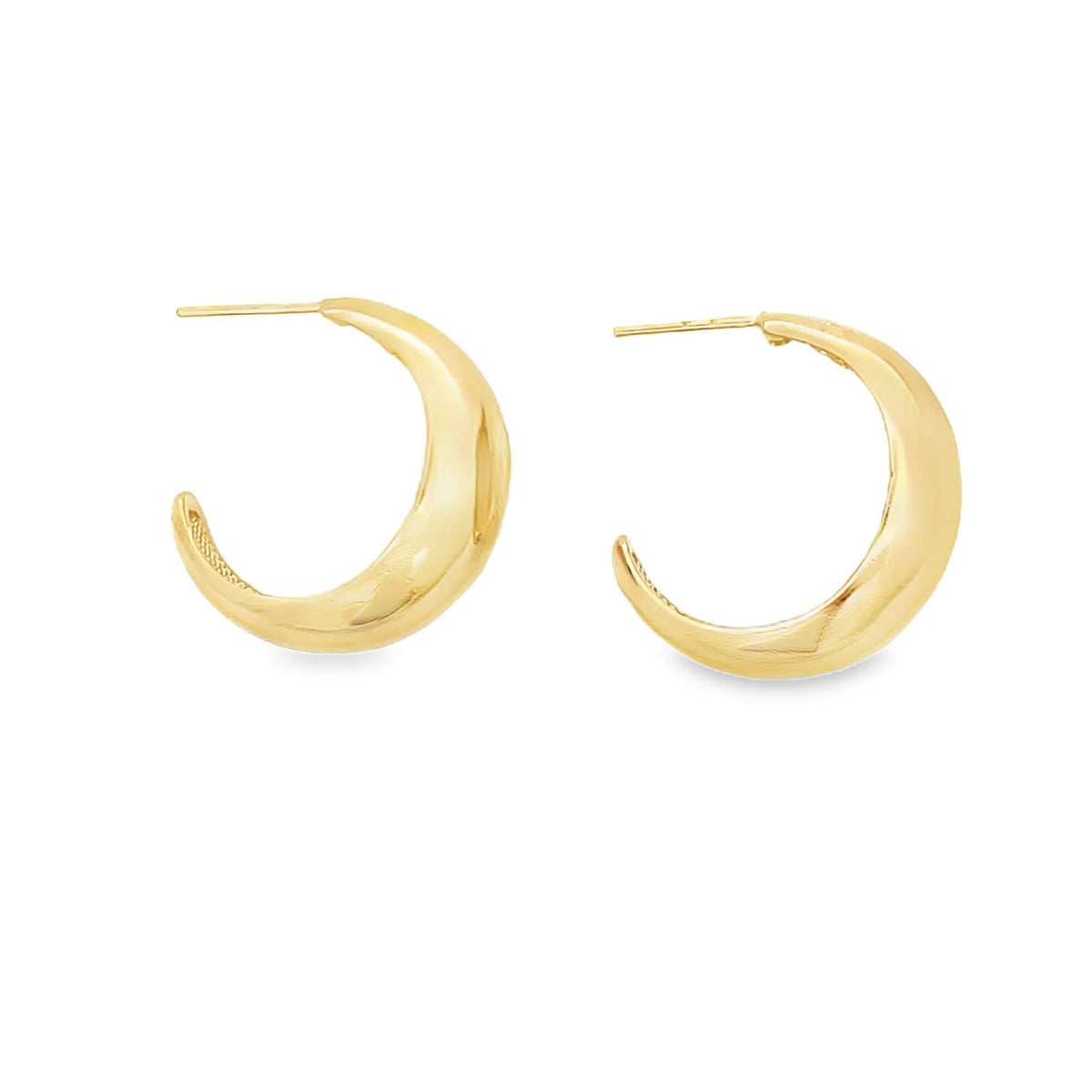A pair of polished gold crescent-shaped hoop earrings rests against a clean white background.
