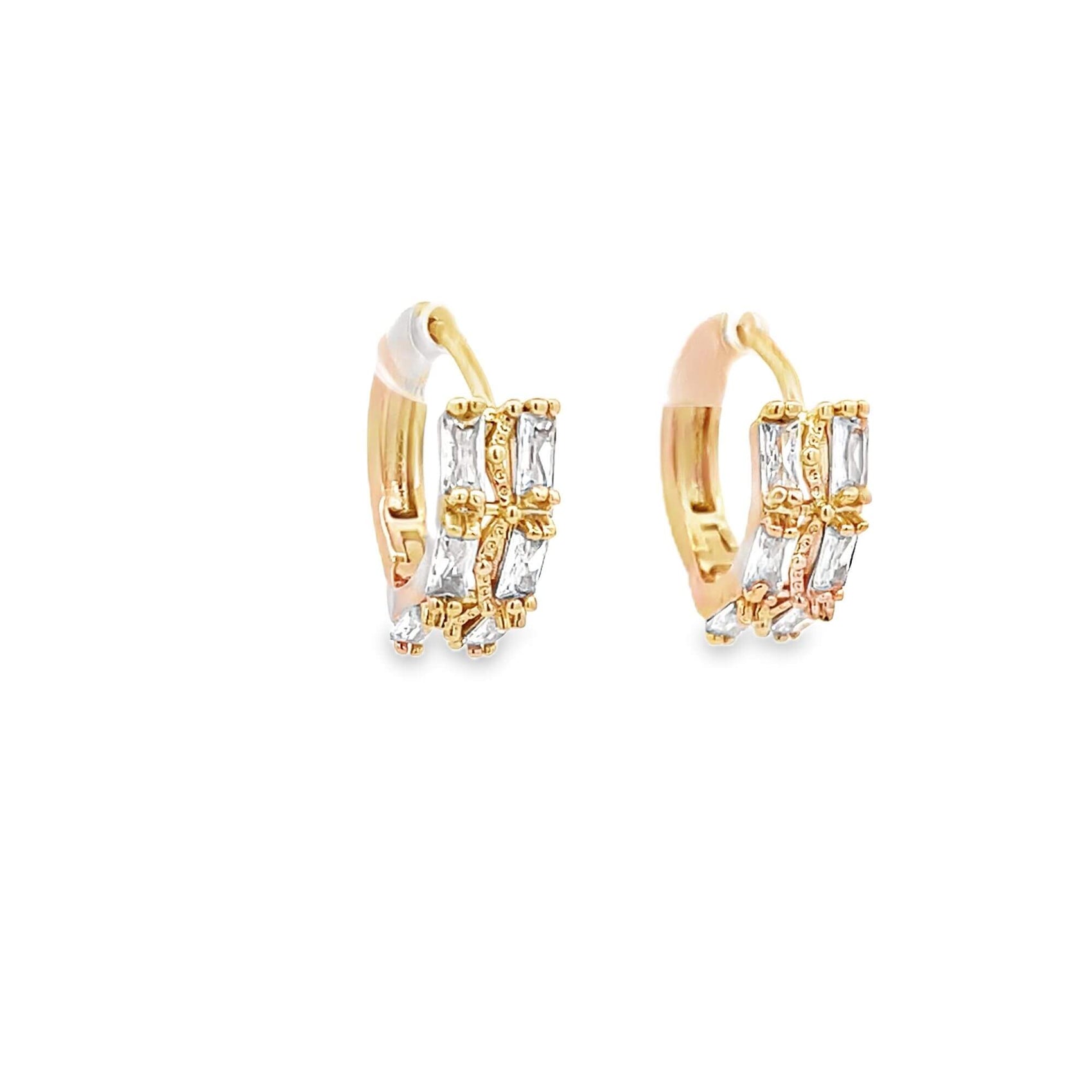 A pair of dazzling gold hoop earrings sparkle with intricate baguette-cut diamonds against a clean white background.