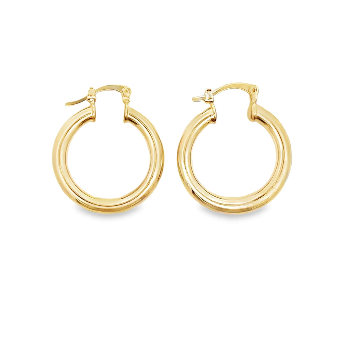 A pair of polished gold hoop earrings rests against a clean white background.