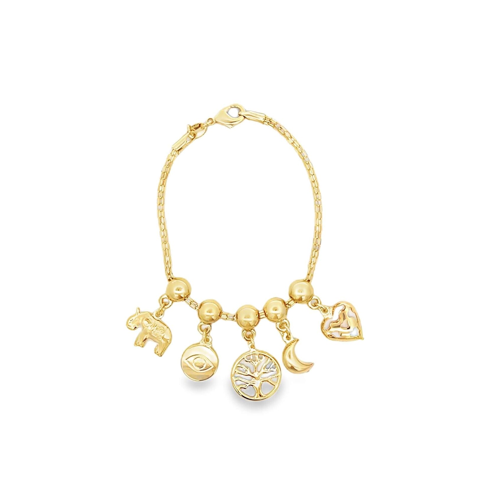 A gold charm bracelet features dangling pendants including an elephant, evil eye, tree of life, crescent moon, and heart against a clean white background.