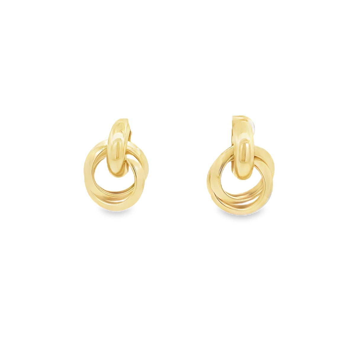 A pair of polished gold interlocking double-loop earrings gleams against a clean white background.