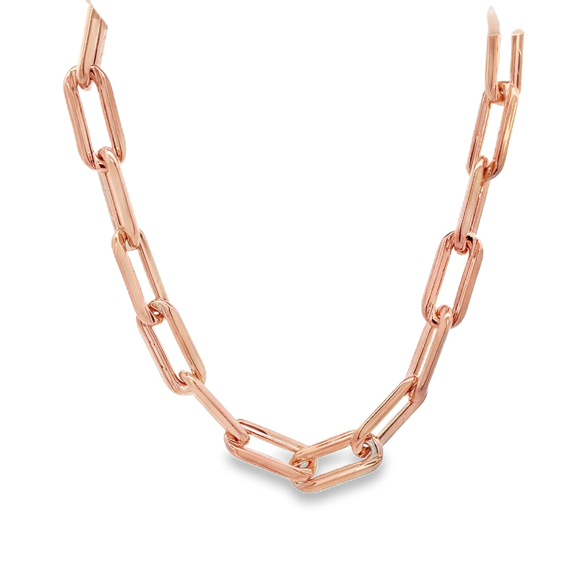 A glossy rose gold paperclip chain necklace displays interlocking rectangular links against a clean white background.