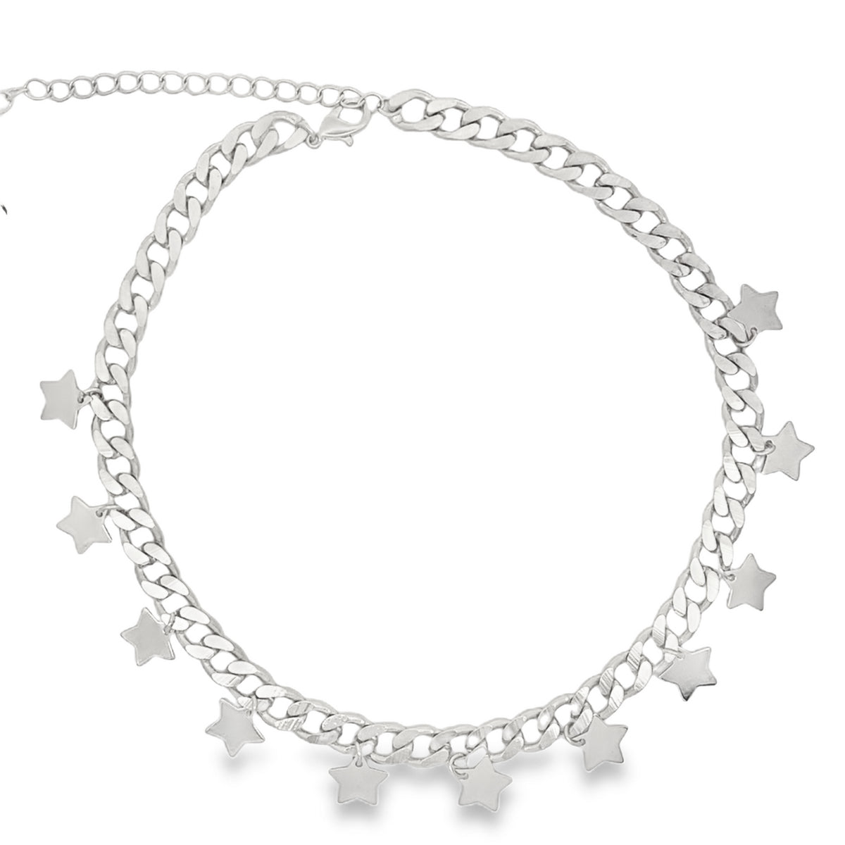 A silver cuban link chain necklace dangles charming star charms along its length.