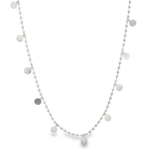 A delicate silver ball chain necklace features dangling coin charms against a white background.