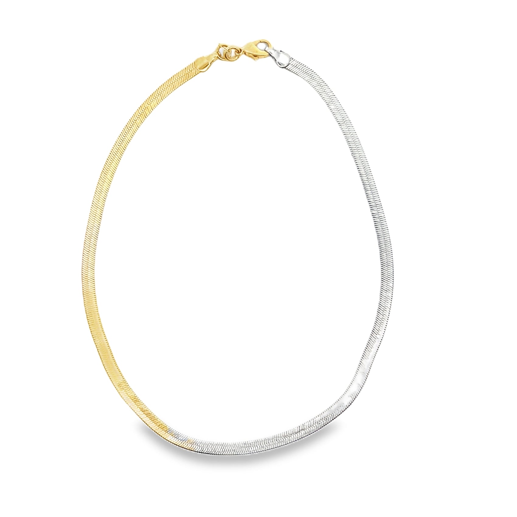A two-tone herringbone chain necklace features a seamless blend of yellow gold and silver links against a clean white background.