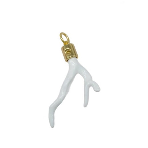 A white enamel branch pendant features a polished gold bail against a clean white background.