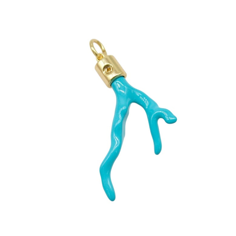 A turquoise enamel coral branch pendant features a gold cap and a small hanging loop against a white background.