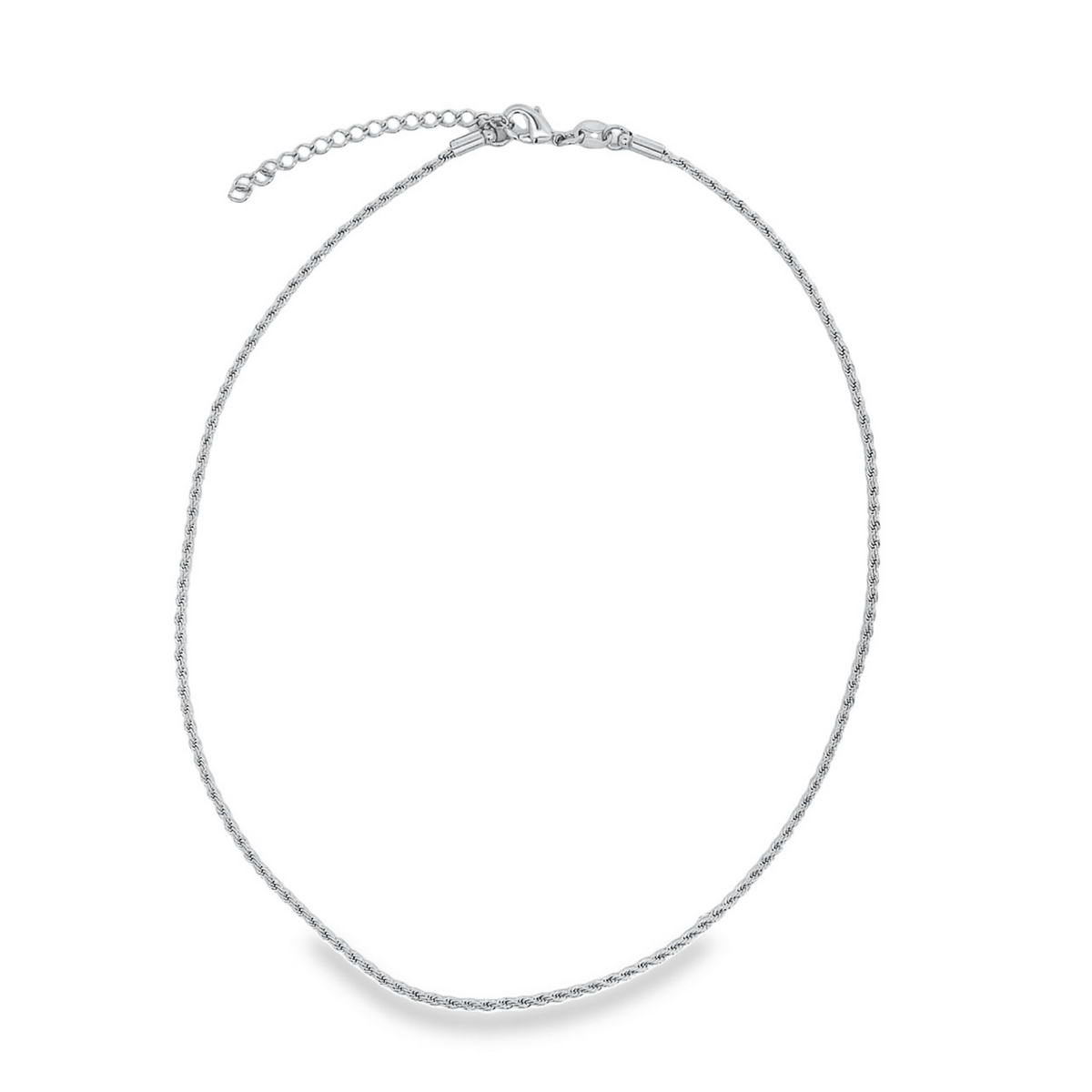 A delicate silver rope chain necklace rests in an oval shape with its clasp visible at the top against a plain white background.