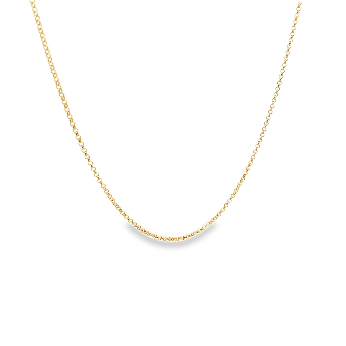 A delicate gold chain necklace drapes in a graceful curve against a clean white background.