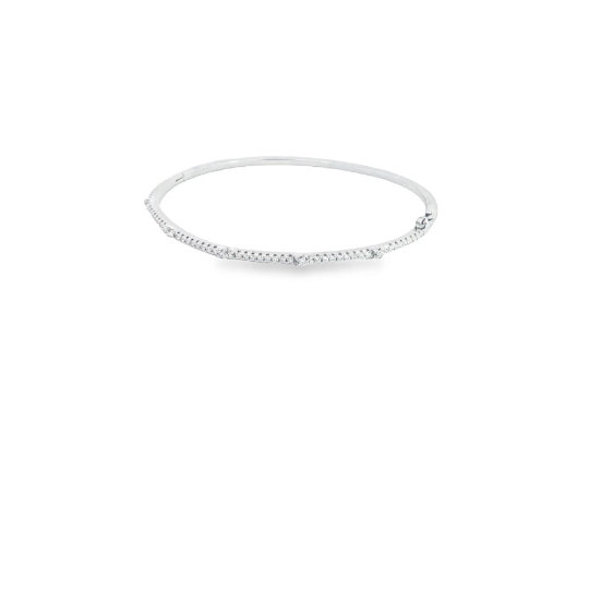 A sleek silver diamond bangle bracelet sparkles against a plain white background.