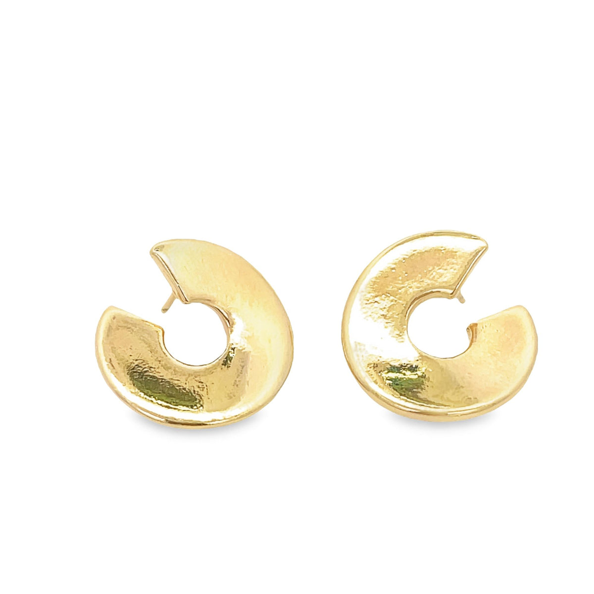 A pair of polished gold crescent-shaped stud earrings rests against a clean white background.