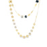 A delicate double-strand gold coin necklace features shimmering circular discs cascading gracefully against a clean white background.