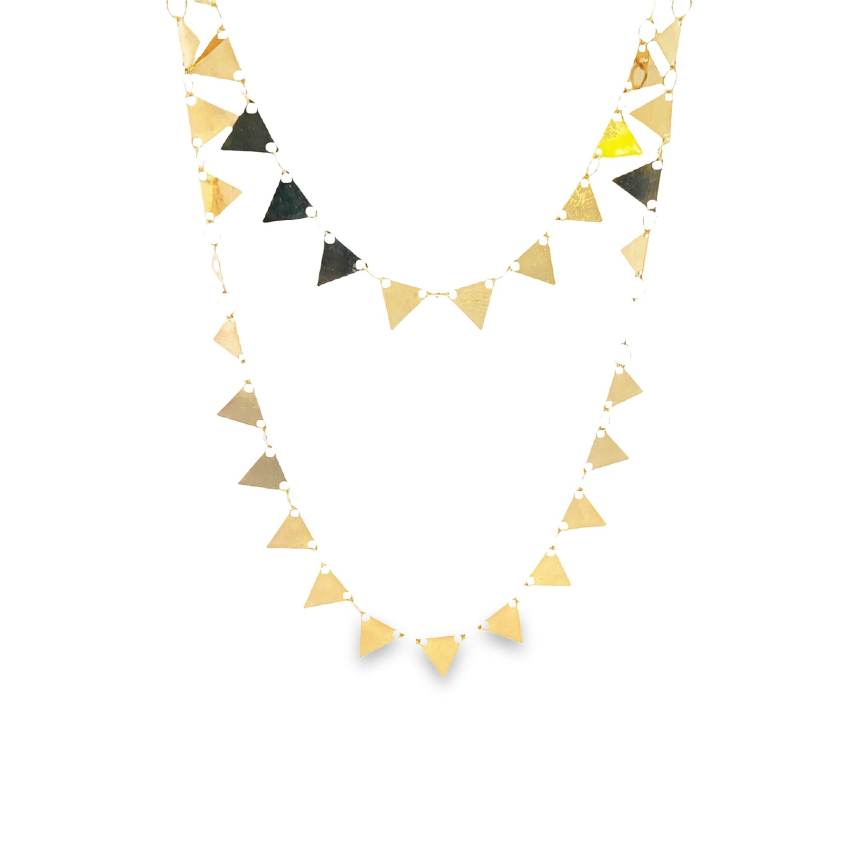 A double-stranded gold necklace features delicate geometric triangle pendants hanging against a plain white background.