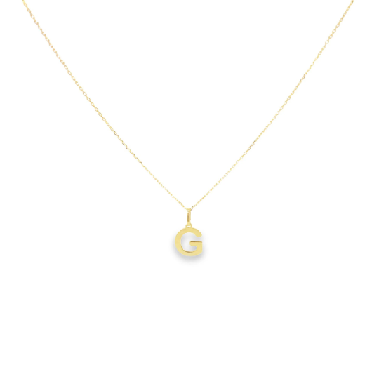 A delicate gold chain holds a shiny letter G pendant against a clean white background.