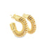 A pair of chunky gold hoop earrings featuring a unique spiral coil design rest against a clean white background.